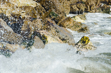 Amazing sea with blue summer wave and rocks, relaxing view of rocks and water
