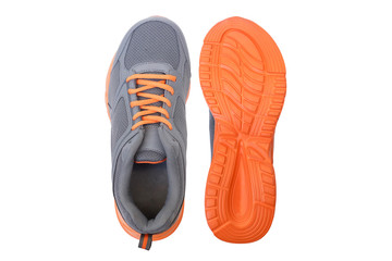 Running shoes with grey and orange colors