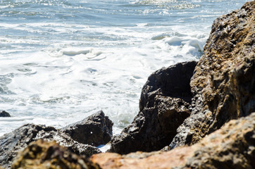 Amazing sea with blue summer wave and rocks, relaxing view of rocks and water