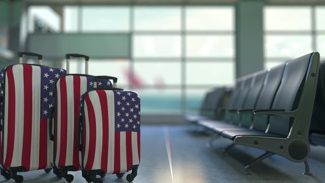 Travel suitcases featuring flag of the United States. American tourism conceptual animation