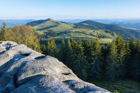 Fototapeta mountain landscape in spring summer village in the mountains house