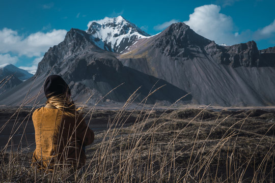 Woman posing on picturesque landscape