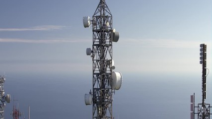 aerial view of telecom antennas telecommunications towers on mountaintop