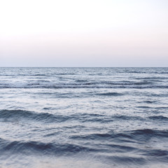 Naklejka na ściany i meble Waves on a wide blue sea