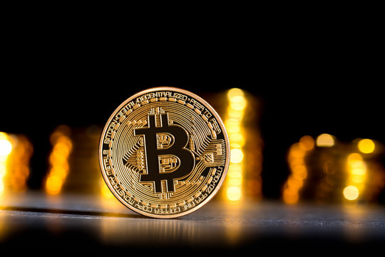 Bitcoin cryptocurrency coin on a dark background