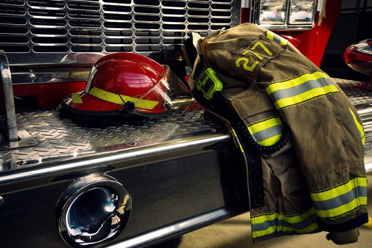 Firemen gear on firefighter truck in the fire station