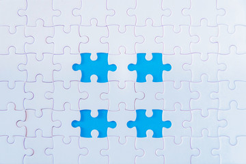 Fototapeta premium White jigsaw puzzle
