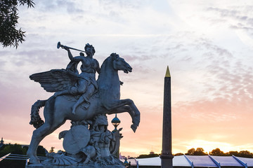 Fototapeta premium statue at sunset in europe