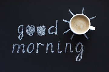 Fototapeta na wymiar Text Good morning, sun chalk on black background, Cup of coffee,