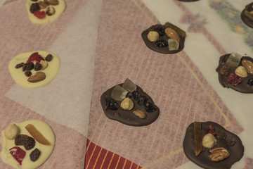 Mendiants de chocolat. Handmade chocolates. Christmas sweets.