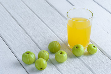 Indian gooseberry on wooden table