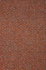 The wall built of bricks, close-up view. Background for various uses.