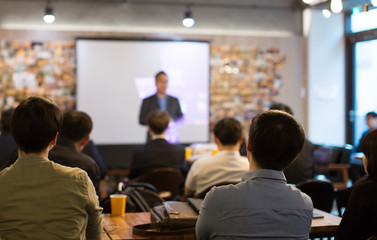 Audience Watching a Presentation. Business. Education. Conference