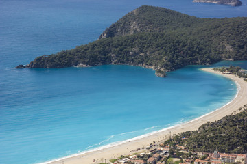 Naklejka premium beautiful oludeniz beach from cliff in mountains near mediterranean sea