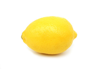 Lemon on white background with shadow. Side view. Close up.