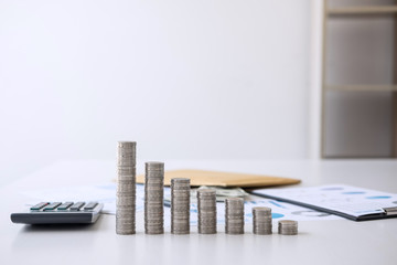Stock financial indices and growth stacking coin and financial costs wisely and carefully, investment and saving concept