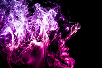 Colored smoke on black background