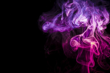 Colored smoke on black background