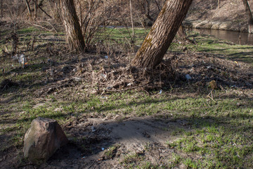 Plastic and polystyrene packaging near the river