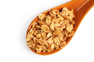Spoon with granola on white background