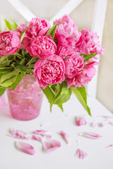 A beautiful bouquet of pink peonies. Bright, gentle interior.

