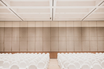 Many white chairs were set for the meeting room