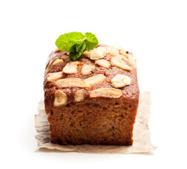 Homemade  banana loaf cake with fresh bananas isolated on white