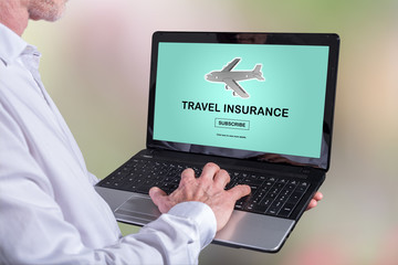 Travel insurance concept on a laptop