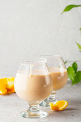 Two cocktail glass with smoothies milkshake healthy drink