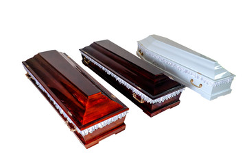 Three closed wooden coffins isolated