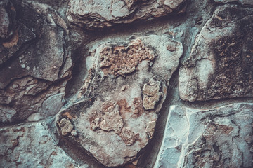 Close up of natural stone wall. Stone wall texture 