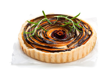 Homemade  vegetarian pie with colored vegetables isolated on white