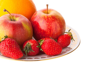 Fruit in a plate on an isolated background