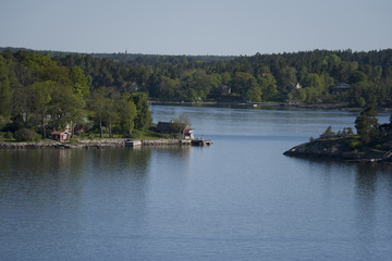 Fototapeta na wymiar A shuttle boat jetty on an island in the Stockholm arcipilago
