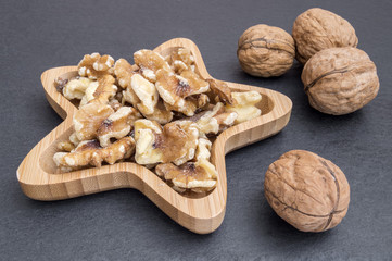 star-shaped bowl stuffed with nuts