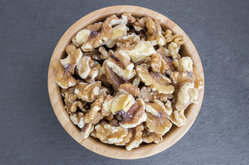 wooden bowl full of nuts