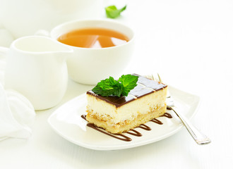 A piece of cheesecake with apple stuffing.