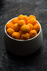 Kaddu or Pumpkin Kheer Or Bhoplyachi Kheer in Marathi and gummadikaya payasam in Telugu, Garnished with dry fruits. served in a bowl over moody background. Selective focus