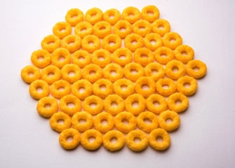 Kaju Katli is a Diamond shape Indian sweet made using cashew sugar and mava, served in a plate or bowl over moody background. selective focus