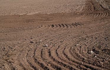 Plowed agriculture field, brown soil