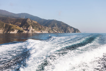 Naklejka premium Sea and mountain views from the yacht. Cinque Terre, Italy, Ligurian Sea