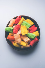 Basundi Or Rabri is an Indian sweet popular in Gujarat and Maharashtra. It is a sweetened condensed milk. Garnished with Dry fruits and Saffron. Served in a bowl over moody background. Selective focus