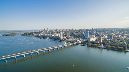 Aerial view on the central bridge of Ukrainian city of Dnieper (Dnipropetrovsk) located on the bank of the big river.