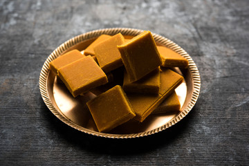 Alphonso Mango Burfi or Hapus Amba Vadi served in a plate, selective focus