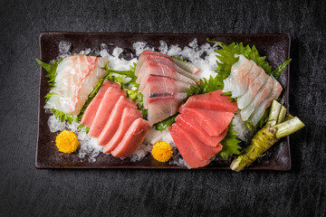 お刺身 sashimi (raw sliced fish, shellfish or crustaceans)