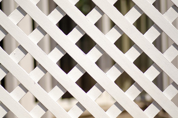 White lattice fence in the street background