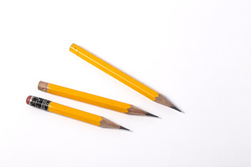 Very short yellow pencil with eraser at the end