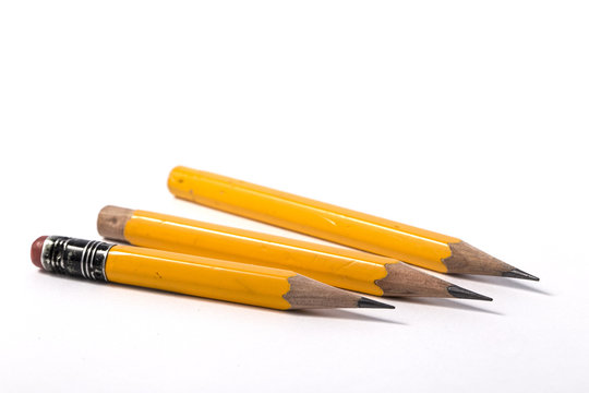 Very short yellow pencil with eraser at the end