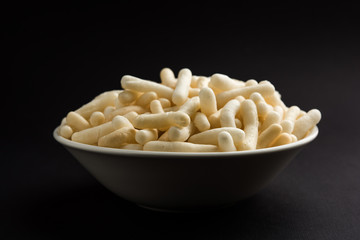 Kaddu or Pumpkin Kheer Or Bhoplyachi Kheer in Marathi and gummadikaya payasam in Telugu, Garnished with dry fruits. served in a bowl over moody background. Selective focus