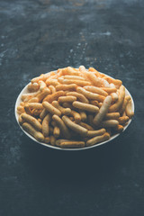 Kaddu or Pumpkin Kheer Or Bhoplyachi Kheer in Marathi and gummadikaya payasam in Telugu, Garnished with dry fruits. served in a bowl over moody background. Selective focus